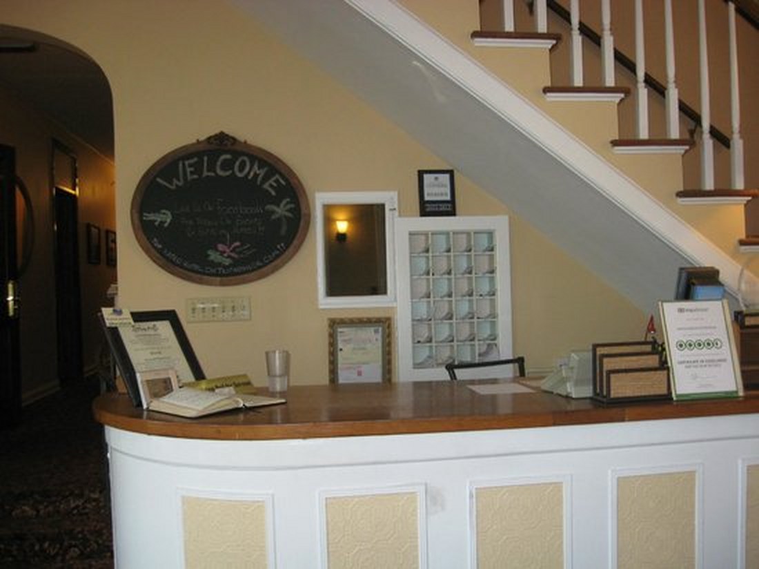 Front desk and staircase at The Inn On Third