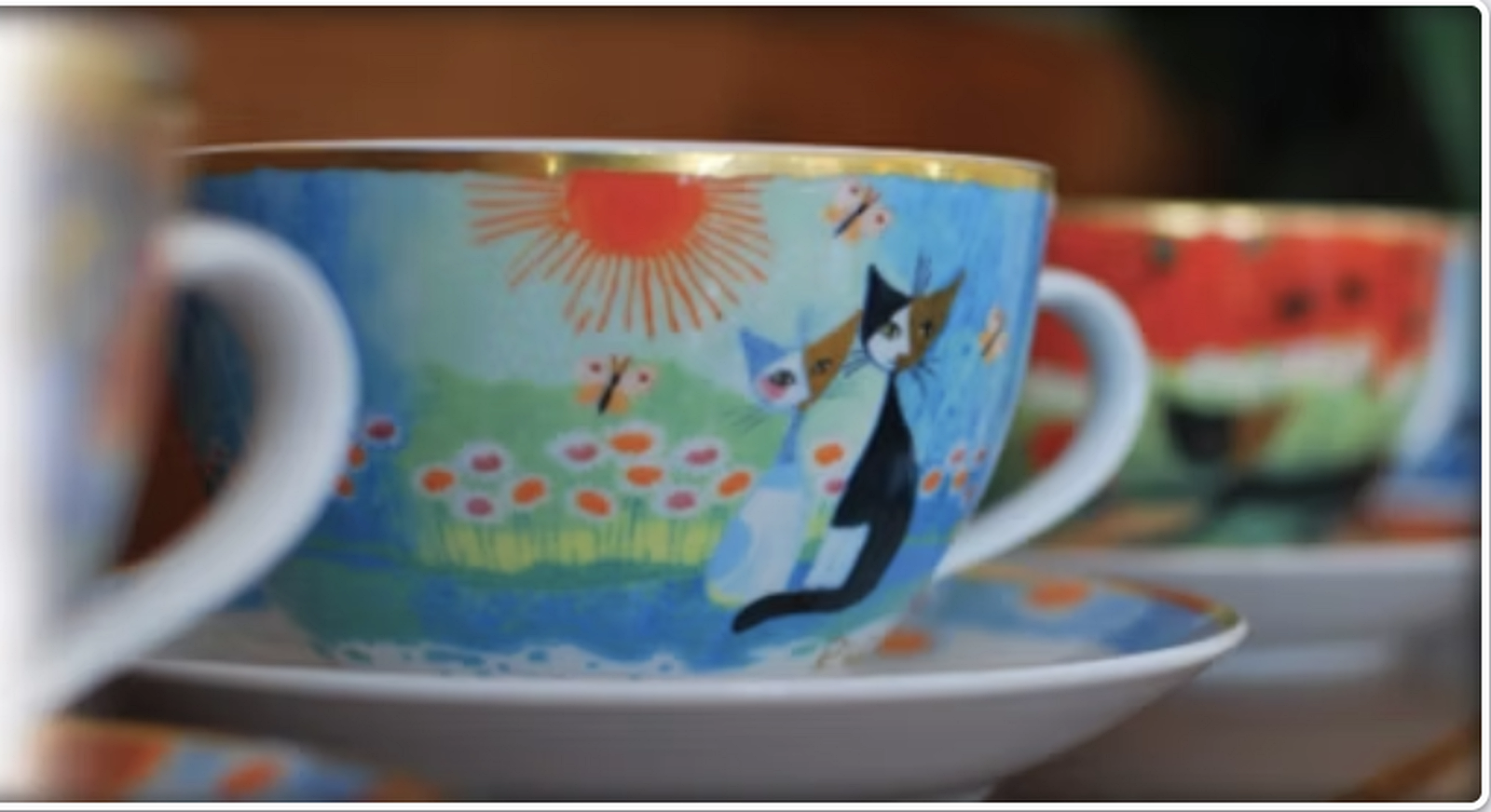 The inn’s colorful cat-painted coffee cup and saucer